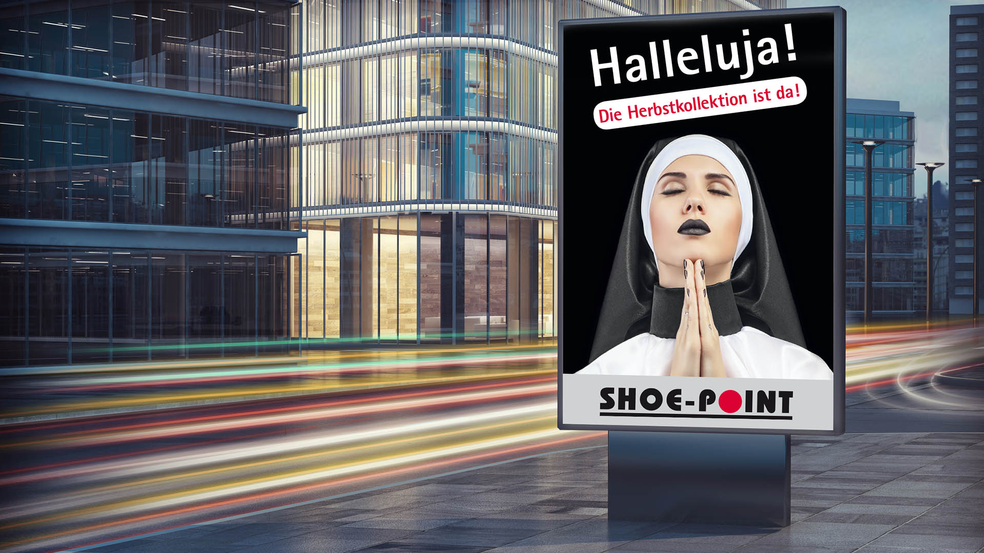 Scribble Werbeagentur nah bei Aachen zeigt eine Nonne auf einem City-Light-Poster.