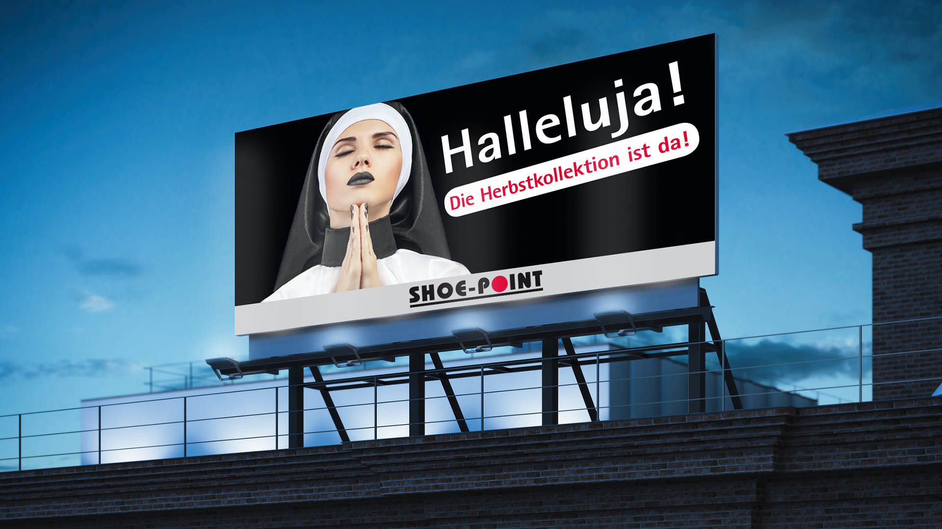 Scribble Werbeagentur nah bei Düsseldorf zeigt eine Nonne auf einem Großplakat.